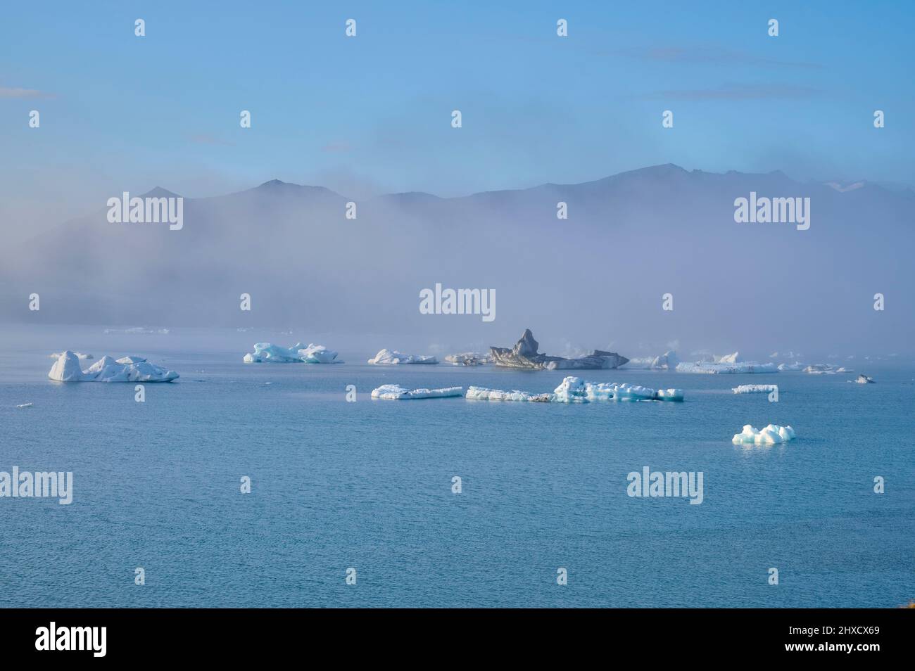 Glacier lagoon, ice, floes, fog. Evening, Summer, Jokulsarlon, Austurland, Iceland Stock Photo