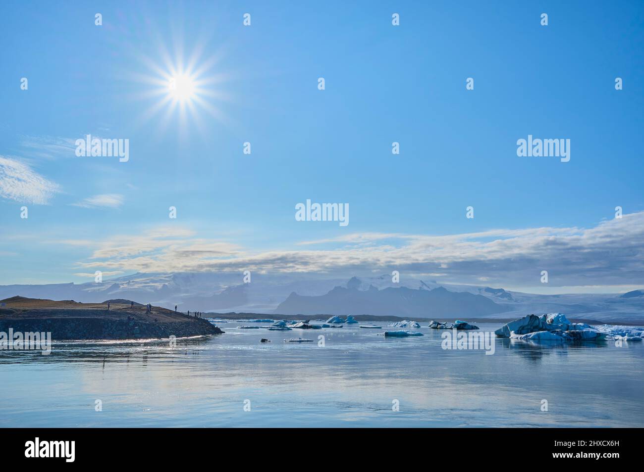 Glacier lagoon, ice, floes, fog, clouds, sun, summer, Jokulsarlon, Austurland, Iceland Stock Photo