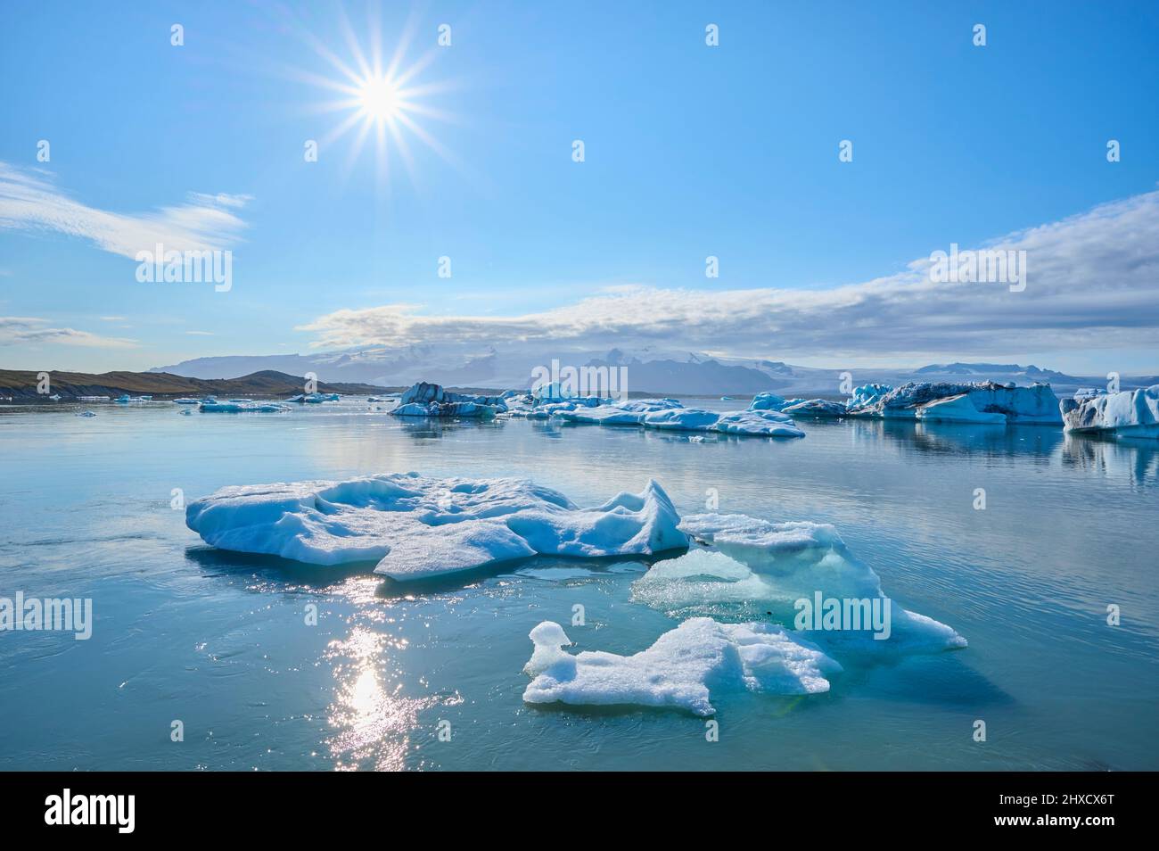 Glacier lagoon, ice, floes, fog, clouds, sun, summer, Jokulsarlon, Austurland, Iceland Stock Photo