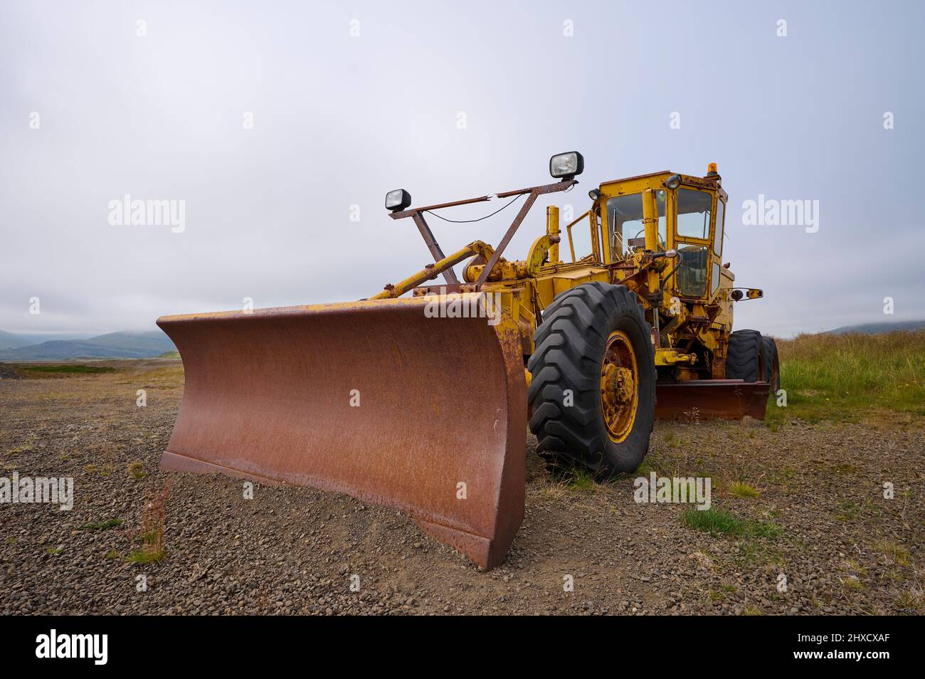 Bulldozer, Grader, Construction machine, Old, Parked, Scrap, Austurland, Iceland Stock Photo