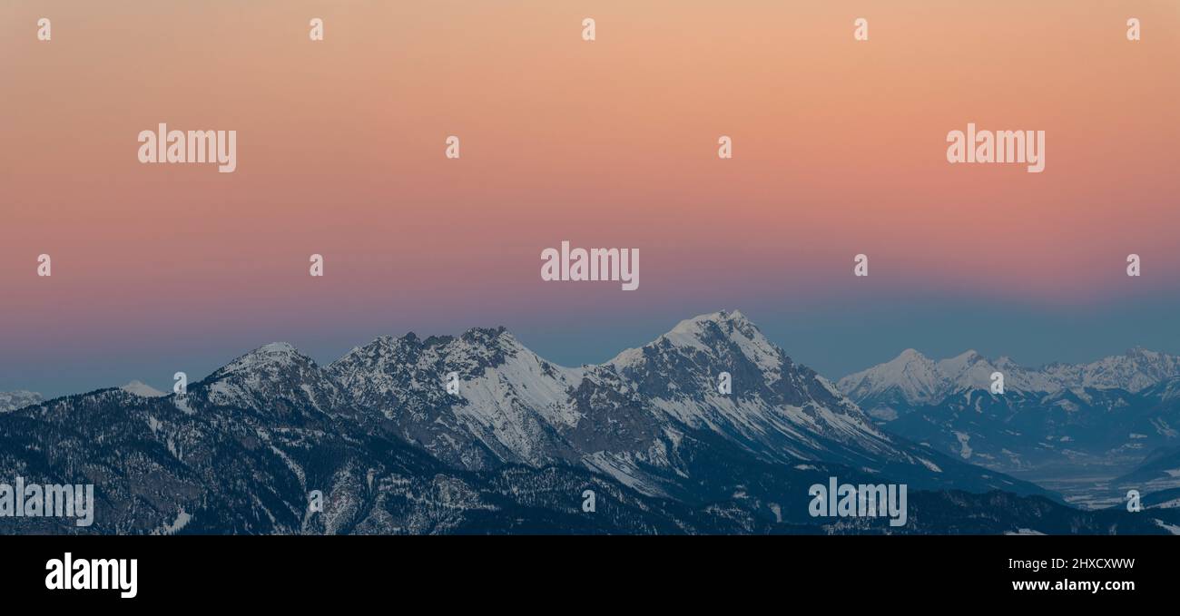 Sunset on the Hochwurzen with a view of the Dachstein group. Stock Photo