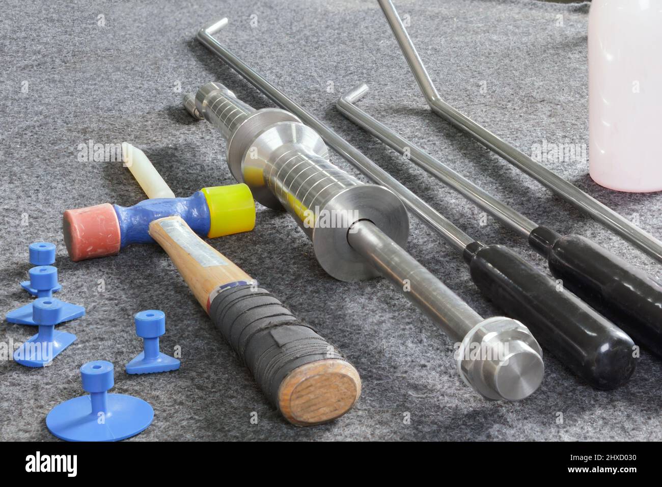 Paintless Dent Repair Kit Tools Set On The Work Table. Stock Photo