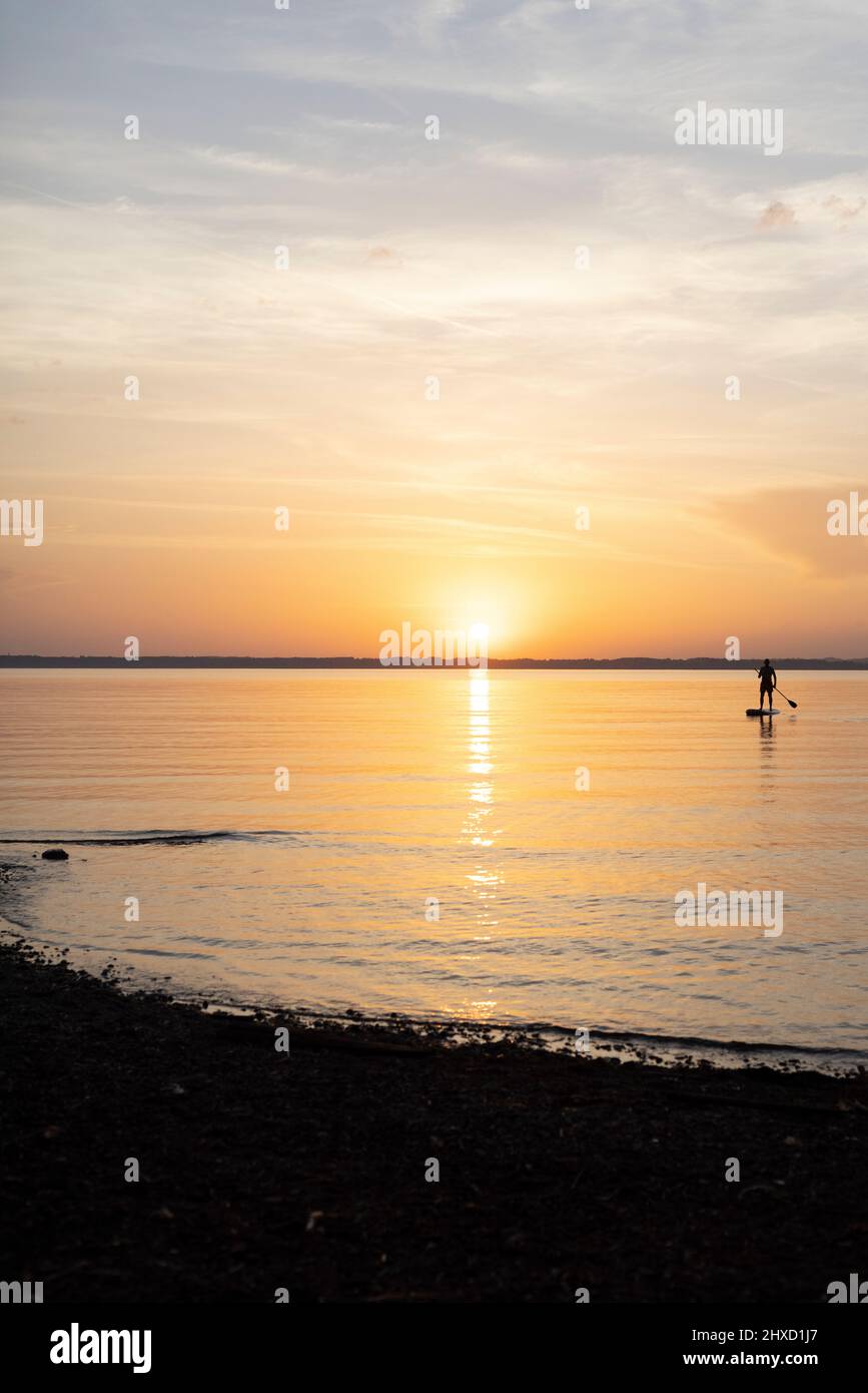Stand up paddling on lake Chiemsee in Bavaria, Germany Stock Photo Alamy