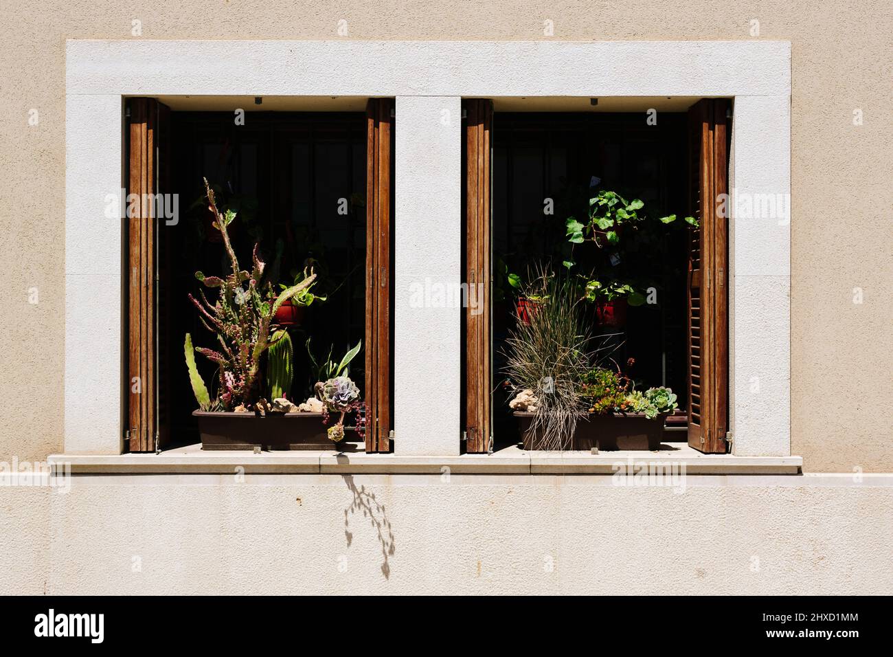 Mediterranean double window in the old town of Sa Cabaneta, Spain Stock Photo