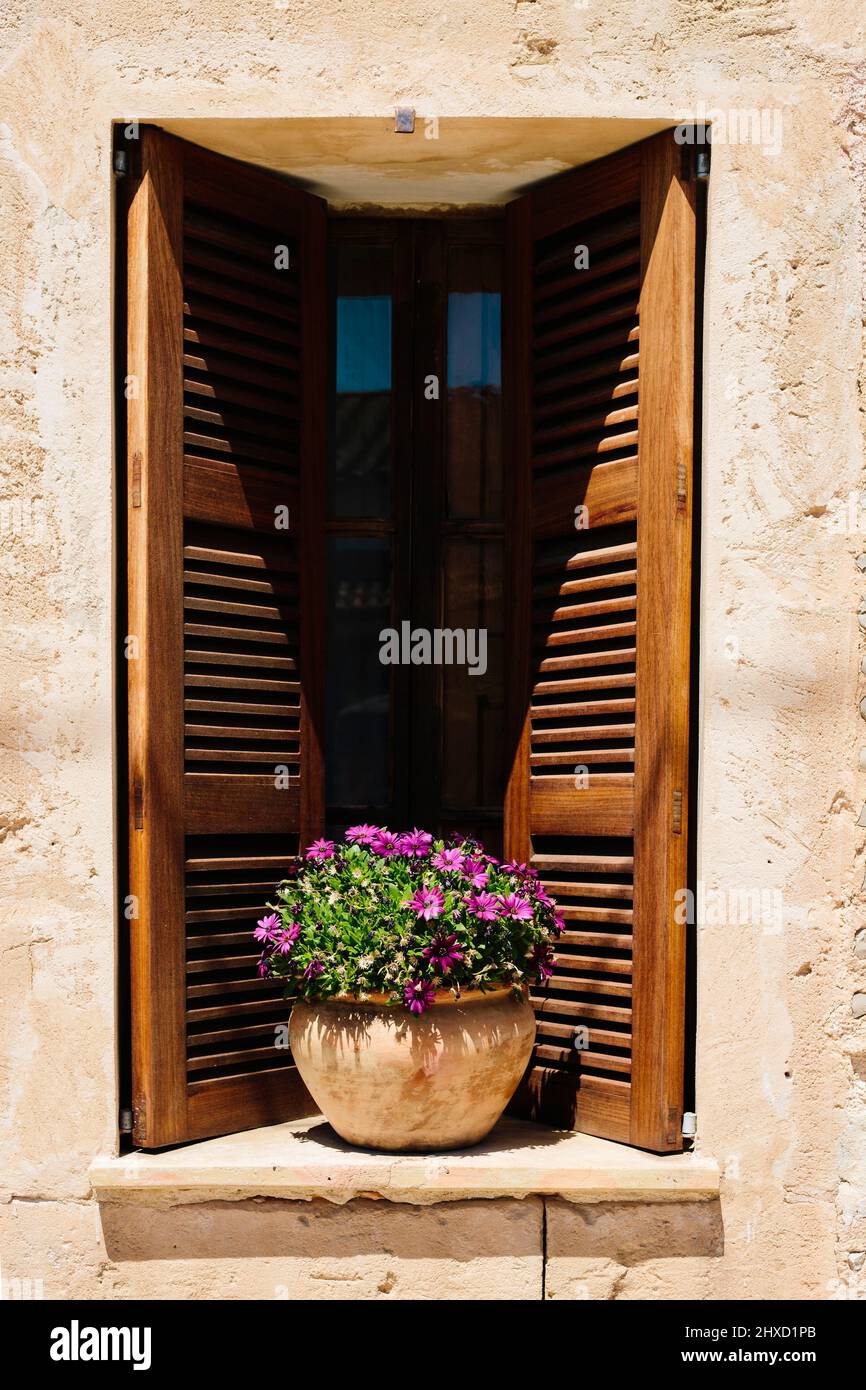 Mediterranean window in the old town of Sa Cabaneta in Mallorca, Spain Stock Photo