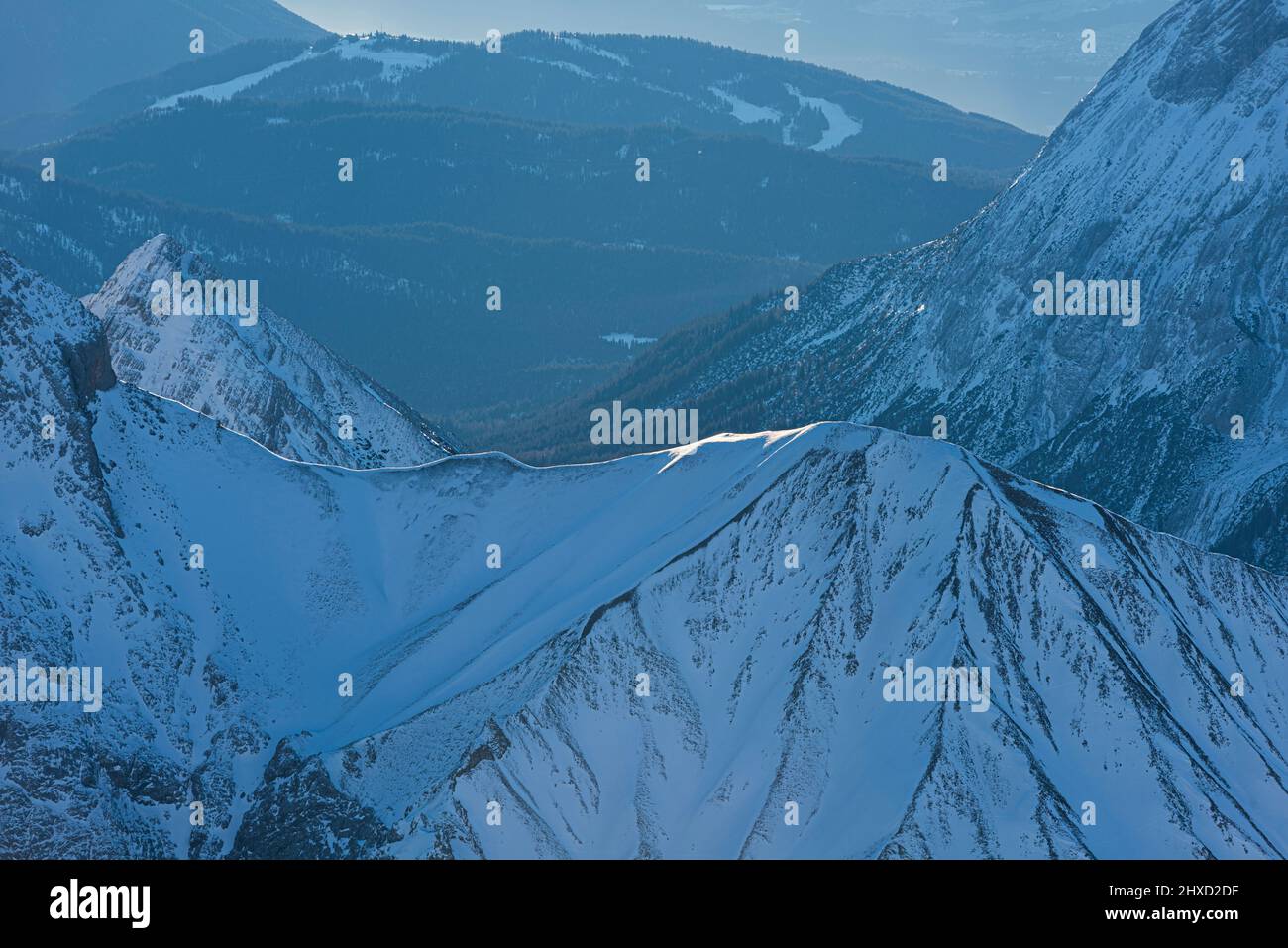 Morning mood on the Zugspitze, sunrise on Germany's highest mountain 'Top of Germany'. Landscape photography. Stock Photo