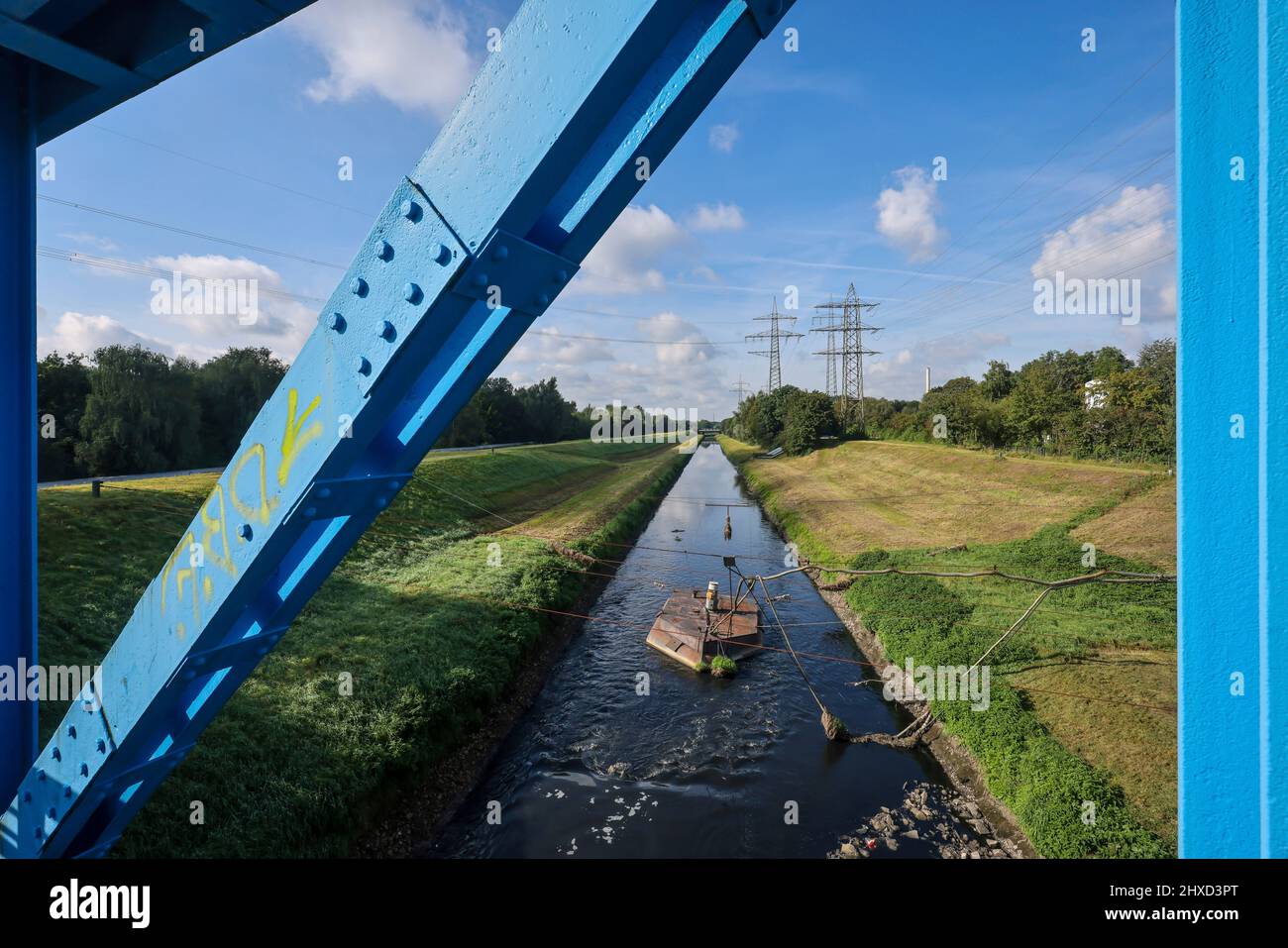 Essen, North Rhine-Westphalia, Germany - The Emscher River has been completely free of wastewater since January 2022 following the construction of a parallel sewer. The river was previously an open, above-ground wastewater canal, combined sewer with surface water and wastewater, here floating filter cleaning plant. Stock Photo