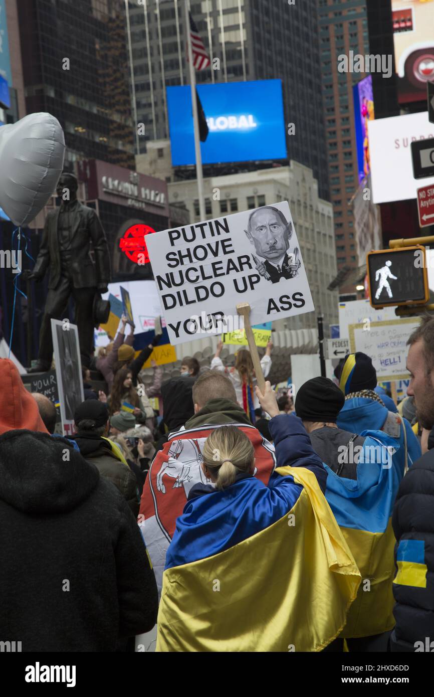 'Stand With Ukraine' demonstration in Times Square in New York City. Ukrainians and other Americans come out to condemn Putin and the Russian attack on Ukraine. Stock Photo