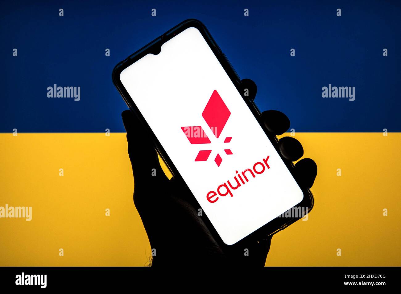 In this photo illustration an Equinor logo seen displayed on a ...