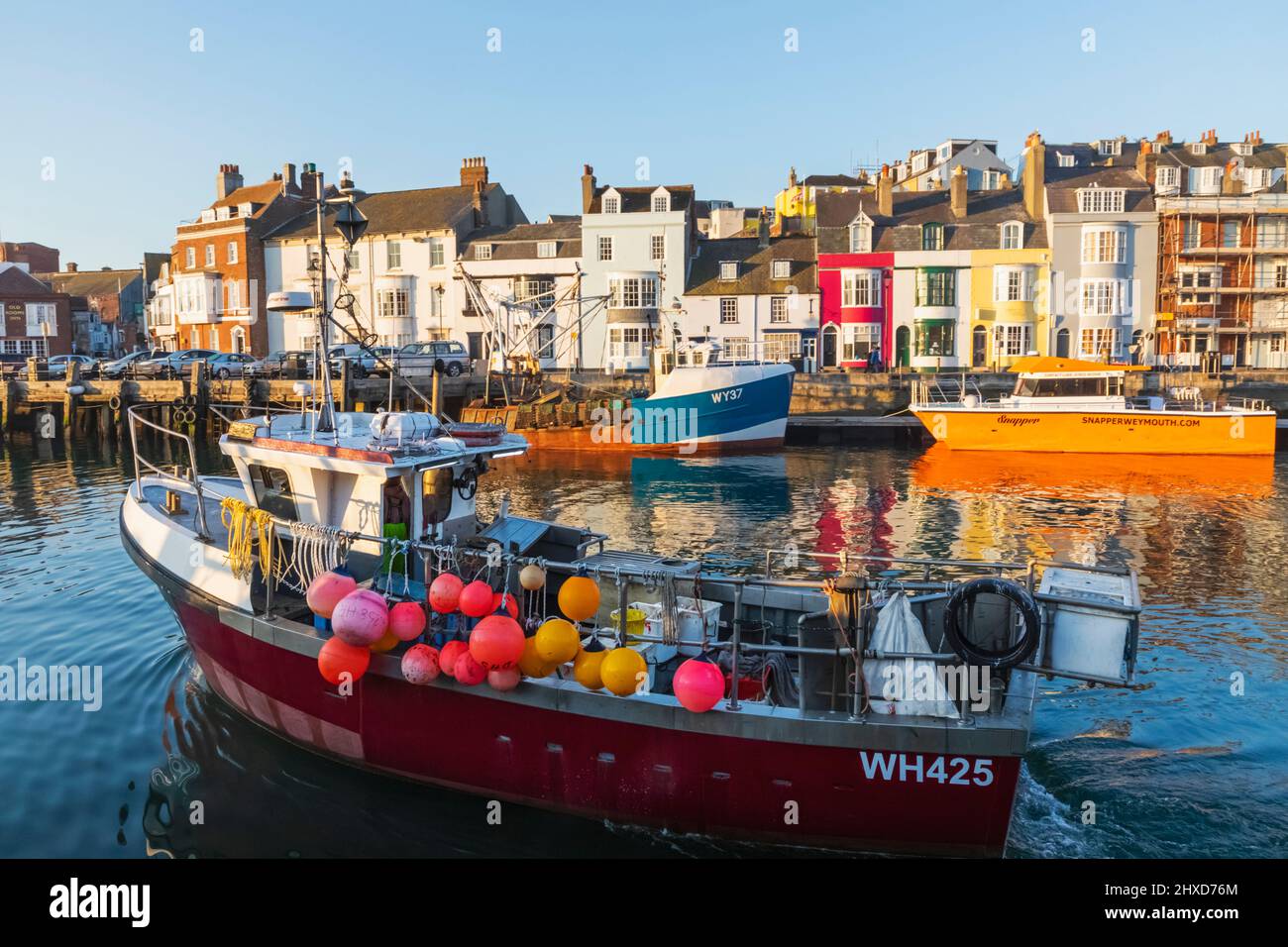 England, Dorset, Weymouth, Weymouth Harbour, Fishing Boat Departing Stock Photo