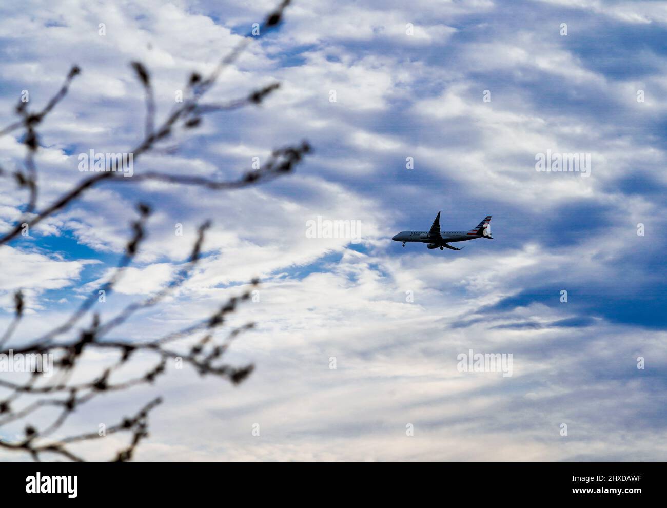 Airplane approaching its destination Stock Photo