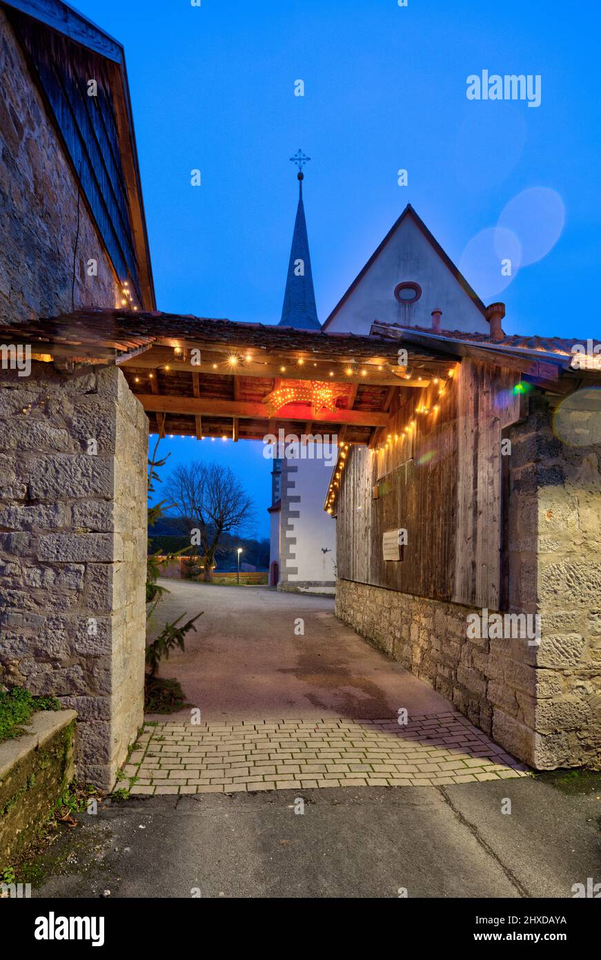 Aschfeld fortified church, blue hour, Advent, St. Boniface, church, Aschfeld, Main-Spessart, Franconia, Bavaria, Germany Stock Photo