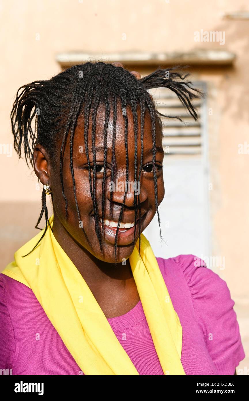 SENEGAL, Thies, TIVAOUANE, school, girl with funny hairstyle / Schule, Mädchen mit lustiger Frisur Stock Photo