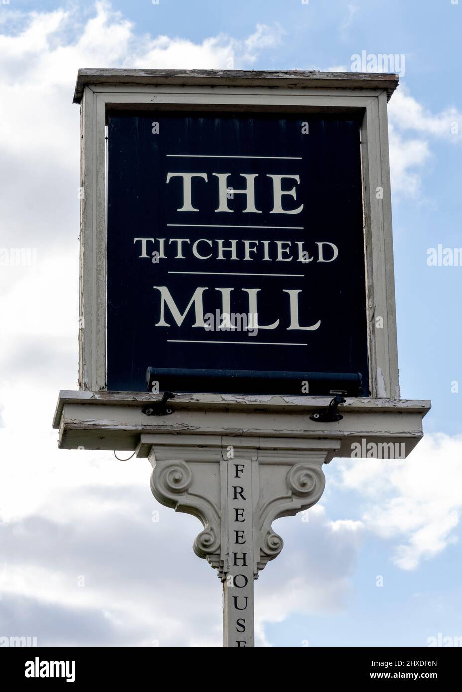 Traditional hanging pub sign at The Titchfield Mill public house, Mill Lane, Titchfield, Fareham, Hampshire, England, UK Stock Photo