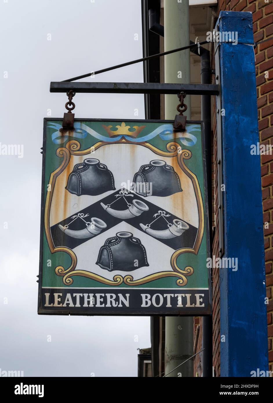 Traditional hanging pub sign at Leathern Bottle public house, Meadrow, Godalming, Surrey, England, UK Stock Photo