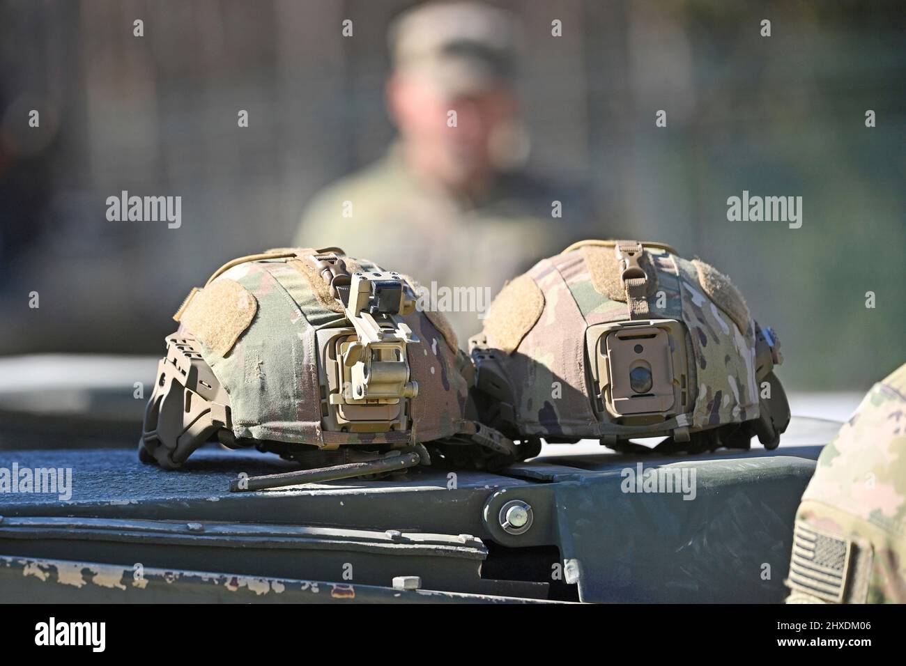 Grafenwoehr, Germany. 11th Mar 2022. Close Up, close-up helmets, helmet, steel helmets. Prime Minister Dr. Markus Soeder visits the US military training area Grafenwoehr, headquarters of the 7th Army Training Command on March 11th, 2022. Credit: dpa picture alliance/Alamy Live News Stock Photo