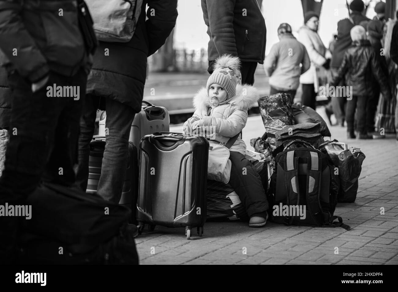 Lviv, Ukraine - March 11, 2022: Ukrainian refugees on Lviv railway station waiting for train to escape to Europe during russian war Stock Photo