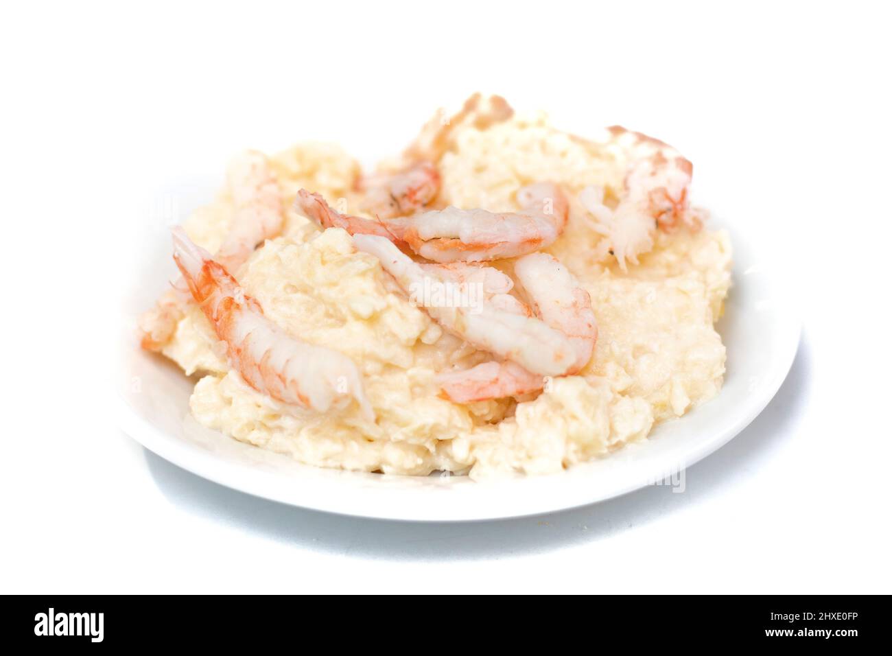 A plate salad with shrimp, Spanish food. Known in Spain as, tapa de ensaladilla de gambas. Stock Photo