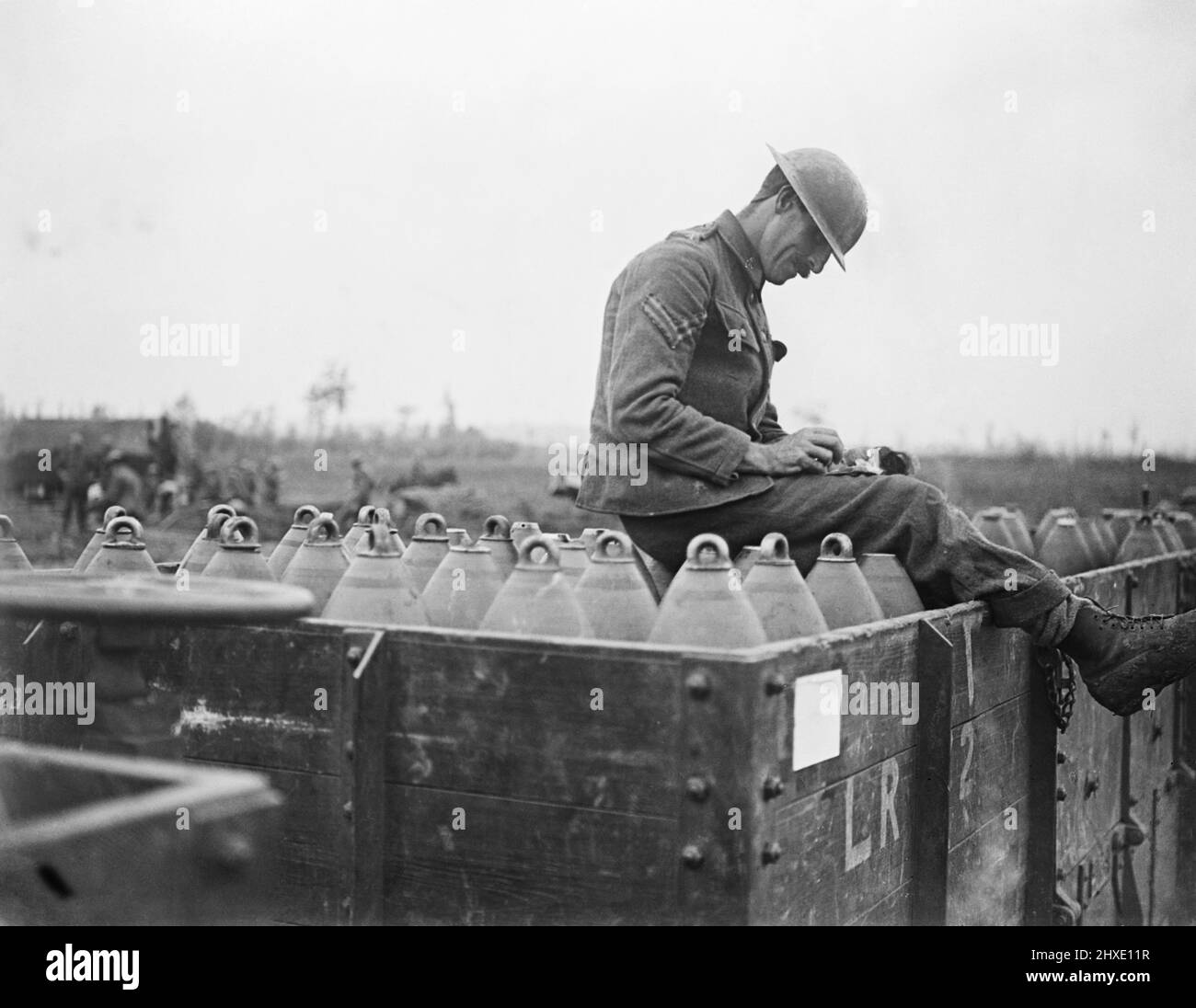 Corporal checking shells in a light railway truck. St. Eloi, 11 August 1917. Stock Photo