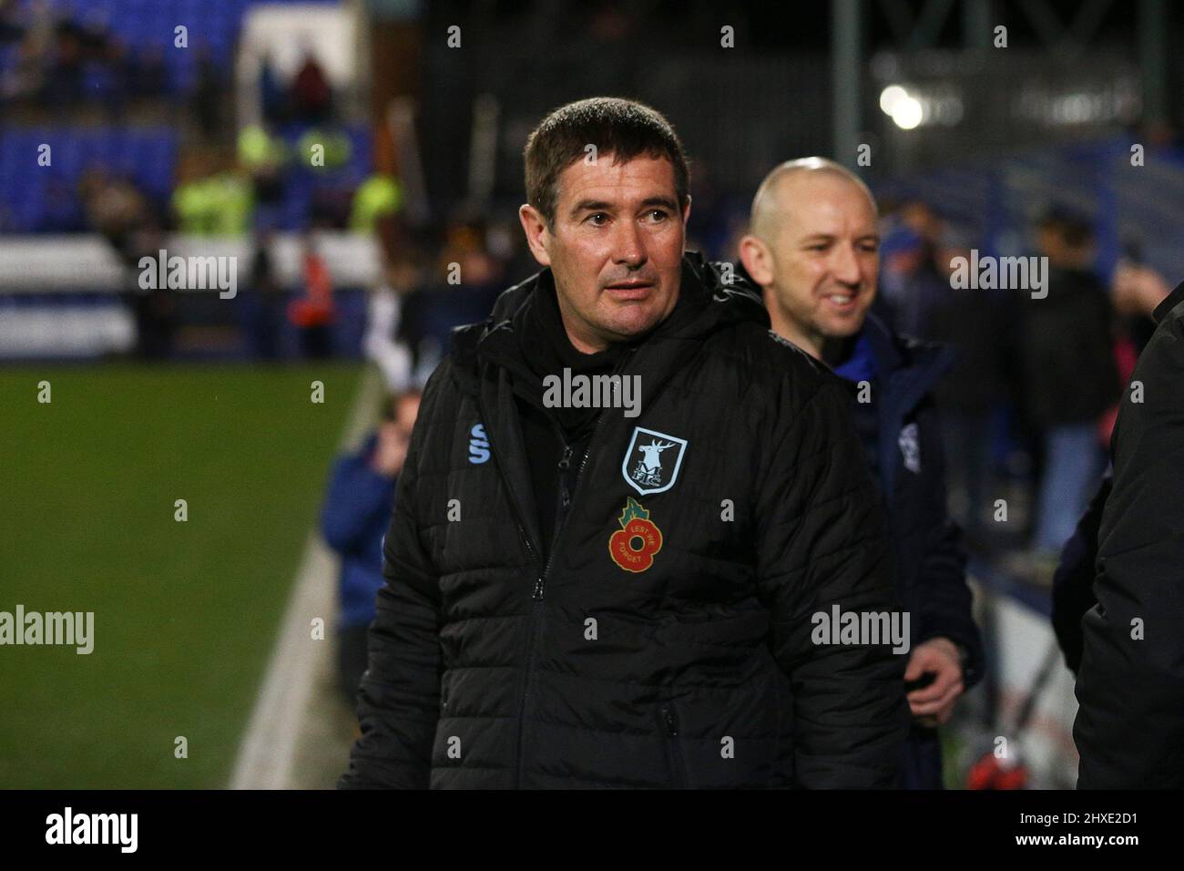 Birkenhead, UK. 11th Mar, 2022. Mansfield Town Manager Nigel Clough looks on. EFL Skybet Football league two match, Tranmere Rovers v Mansfield Town at Prenton Park, Birkenhead, Wirral on Friday 11th March 2022. this image may only be used for Editorial purposes. Editorial use only, license required for commercial use. No use in betting, games or a single club/league/player publications.pic by Chris Stading/Andrew Orchard sports photography/Alamy Live News Credit: Andrew Orchard sports photography/Alamy Live News Stock Photo