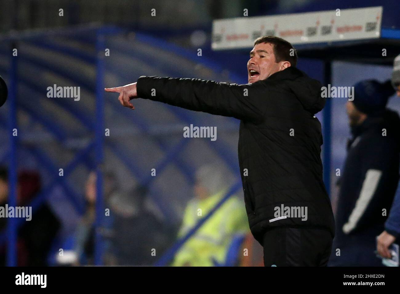 Birkenhead, UK. 11th Mar, 2022. Mansfield Town Manager Nigel Clough shouts instructions. EFL Skybet Football league two match, Tranmere Rovers v Mansfield Town at Prenton Park, Birkenhead, Wirral on Friday 11th March 2022. this image may only be used for Editorial purposes. Editorial use only, license required for commercial use. No use in betting, games or a single club/league/player publications.pic by Chris Stading/Andrew Orchard sports photography/Alamy Live News Credit: Andrew Orchard sports photography/Alamy Live News Stock Photo