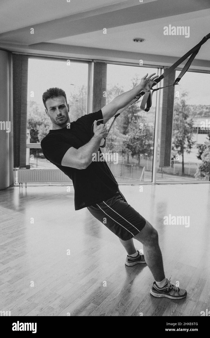 Functional Fitness Workout in Sport Gym With Suspension Training Trx Stock Photo Alamy