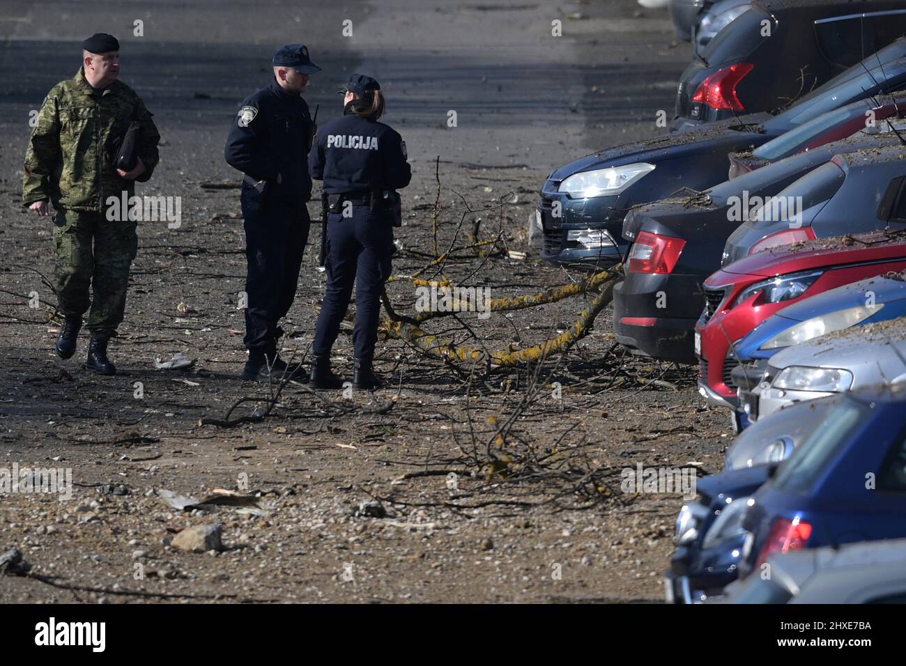 (220312) -- ZAGREB, March 12, 2022 (Xinhua) -- Police conduct an investigation in cooperation with military police after an unidentified military drone crashed in the area of Jaraun, Zagreb on March 10, 2022. An unmanned drone that crashed in the Jarun area of southwest Zagreb late Thursday is of military design and Russian-made, Croatian Prime Minister Andrej Plenkovic said on Friday. The Croatian government said on Friday that the drone had entered Croatian air space from Hungary. On the ground it caused a large crater and two parachutes were found in a wooded area. Some cars at the sce Stock Photo