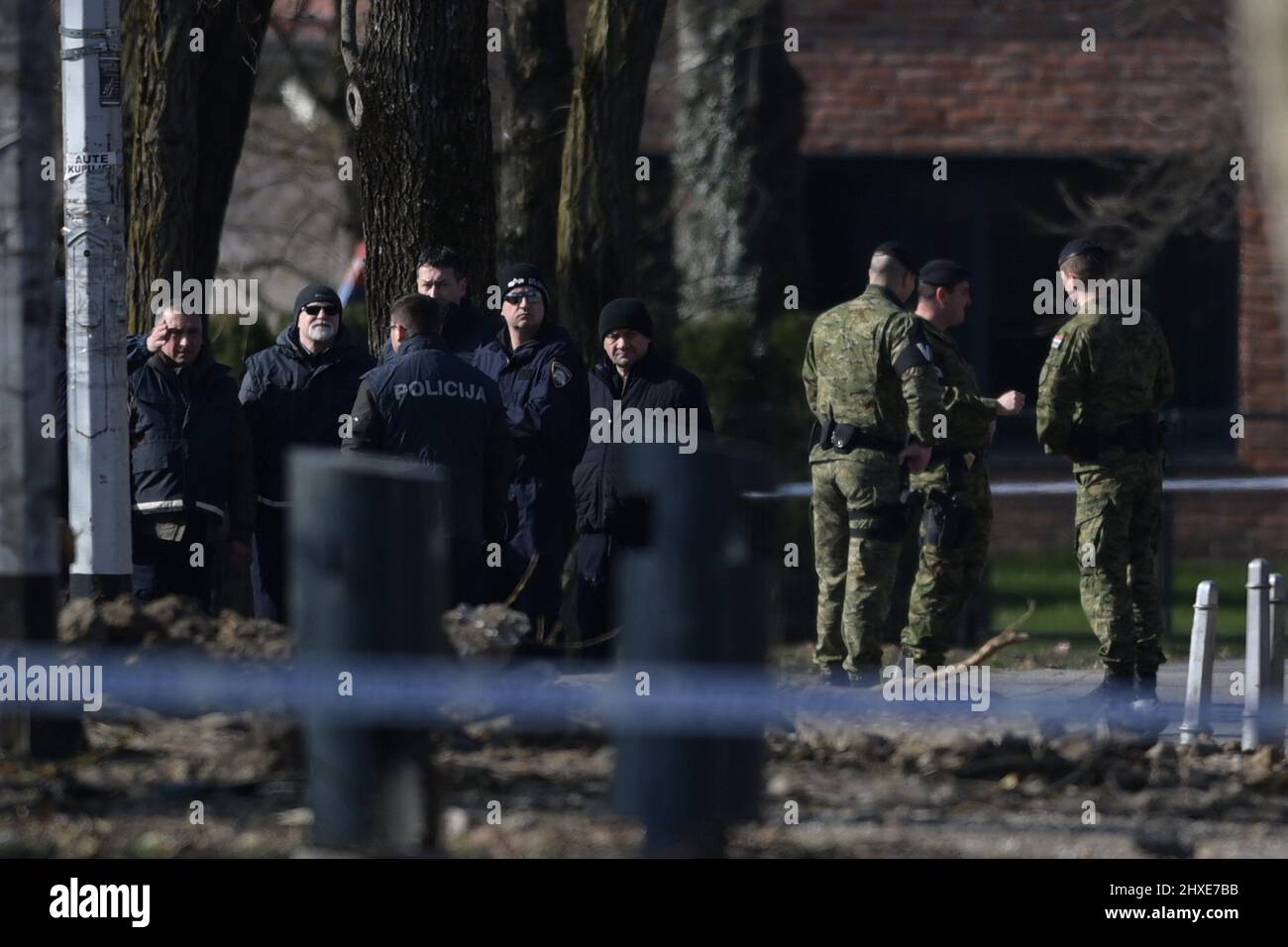 (220312) -- ZAGREB, March 12, 2022 (Xinhua) -- Police conduct an investigation in cooperation with military police after an unidentified military drone crashed in the area of Jaraun, Zagreb on March 10, 2022. An unmanned drone that crashed in the Jarun area of southwest Zagreb late Thursday is of military design and Russian-made, Croatian Prime Minister Andrej Plenkovic said on Friday. The Croatian government said on Friday that the drone had entered Croatian air space from Hungary. On the ground it caused a large crater and two parachutes were found in a wooded area. Some cars at the sce Stock Photo