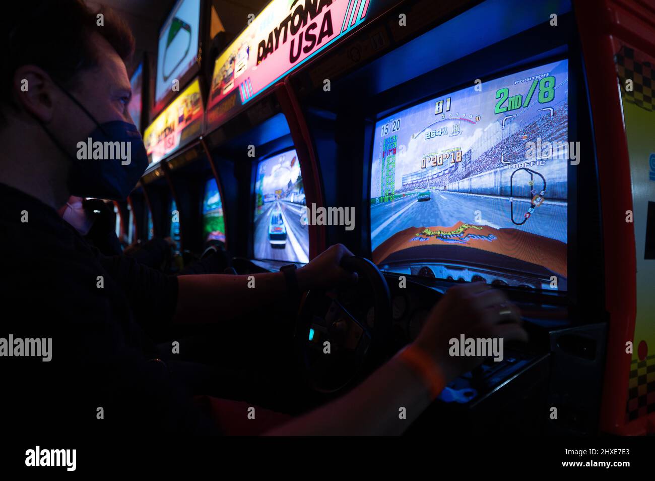 Seligenstadt, Germany. 05th Mar, 2022. Visitors play the arcade game  Daytona USA at the Pinball and Arcade Museum. The museum, which is run by  the association For Amusement Only, is open to