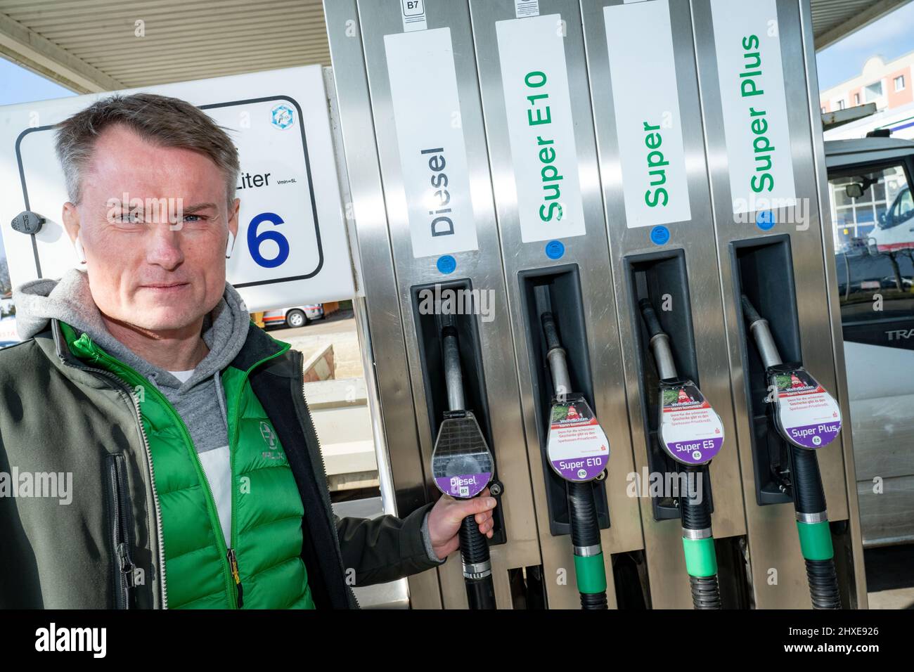 Bansin, Germany. 10th Mar, 2022. Steven Wollenberg, gas station leaseholder, stands at a gas pump. Due to the explosion in fuel prices, gas station operators on the German-Polish border on the island of Usedom are worried about their livelihood. Credit: Stefan Sauer/dpa/Alamy Live News Stock Photo