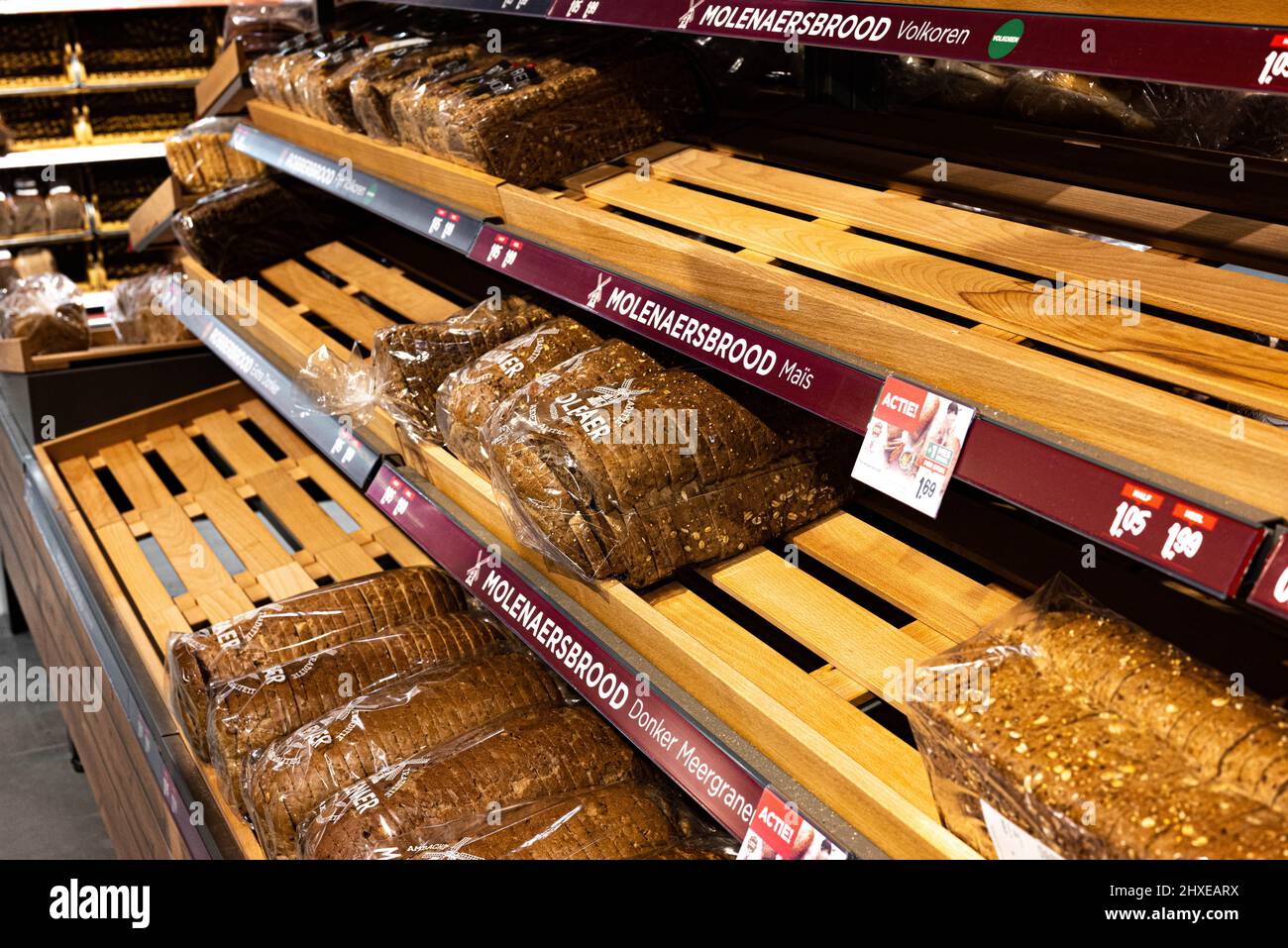 bread on breadboards become more expensive due to the war in Ukraine in a Dutch supermarket Stock Photo
