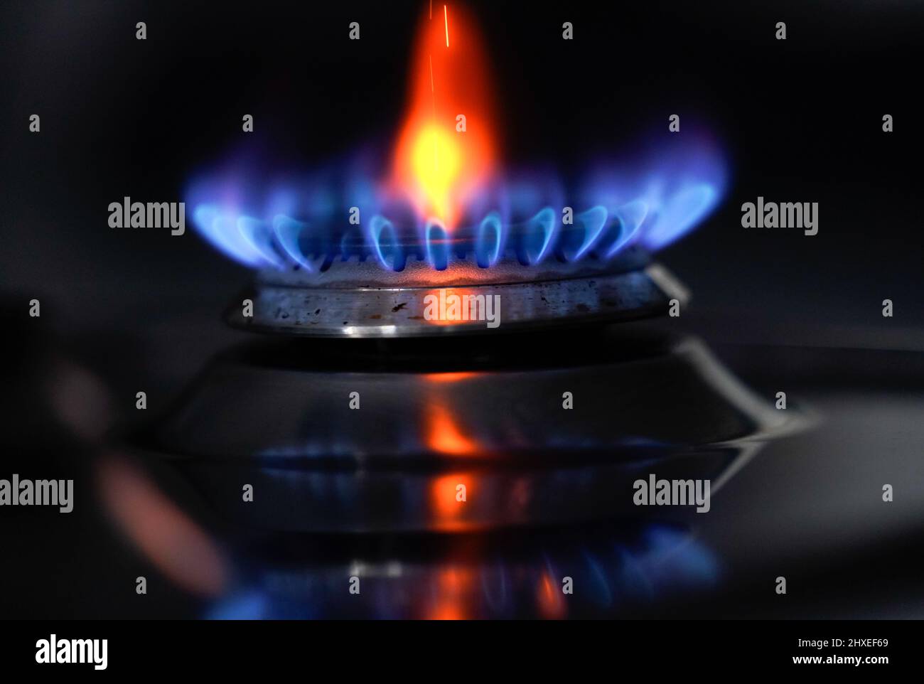 File photo dated 03/02/22 of a gas hob burning on a stove in a kitchen in Basingstoke, Hampshire. Energy bills are set to rise at least 14 times faster than wages this year, new research suggests. Issue date: Saturday March 12, 2022. Stock Photo