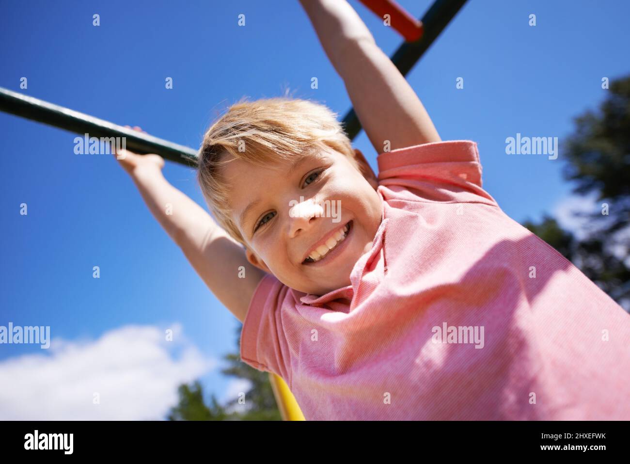 Playtime. A little boy playing in the park. Stock Photo