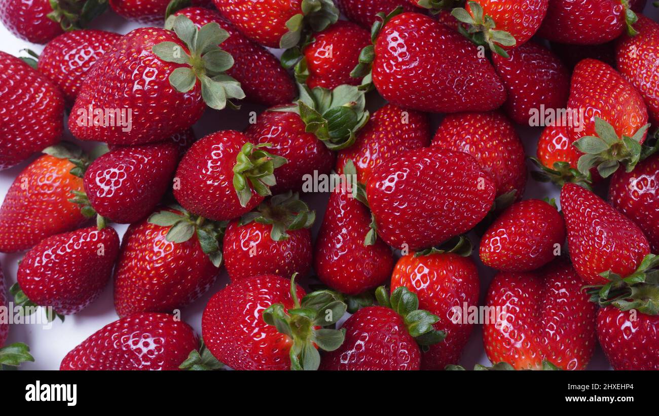 Strawberry fresh organic fruit. Strawberries with leaves on a white ...