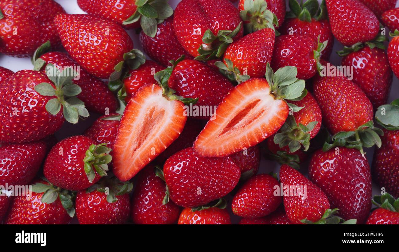 Strawberry fresh organic fruit. Strawberries with leaves on a white ...
