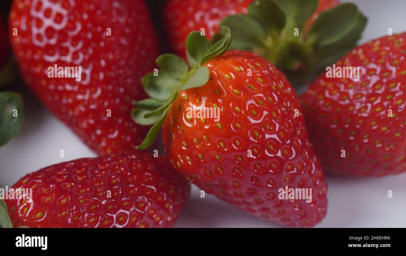 Strawberry fresh organic fruit. Strawberries with leaves on a white ...