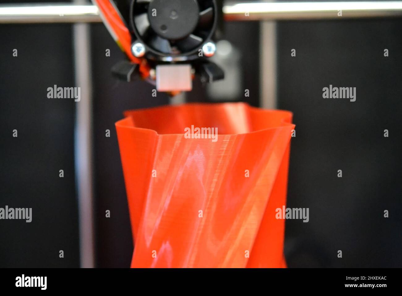 Automatic three dimensional 3d printer performs plastic. Stock Photo