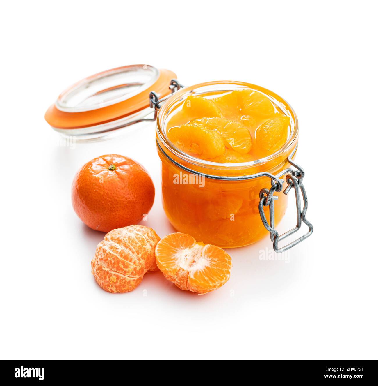 Canned tangerine. Pickled mandarin fruit in jar isolated on a white