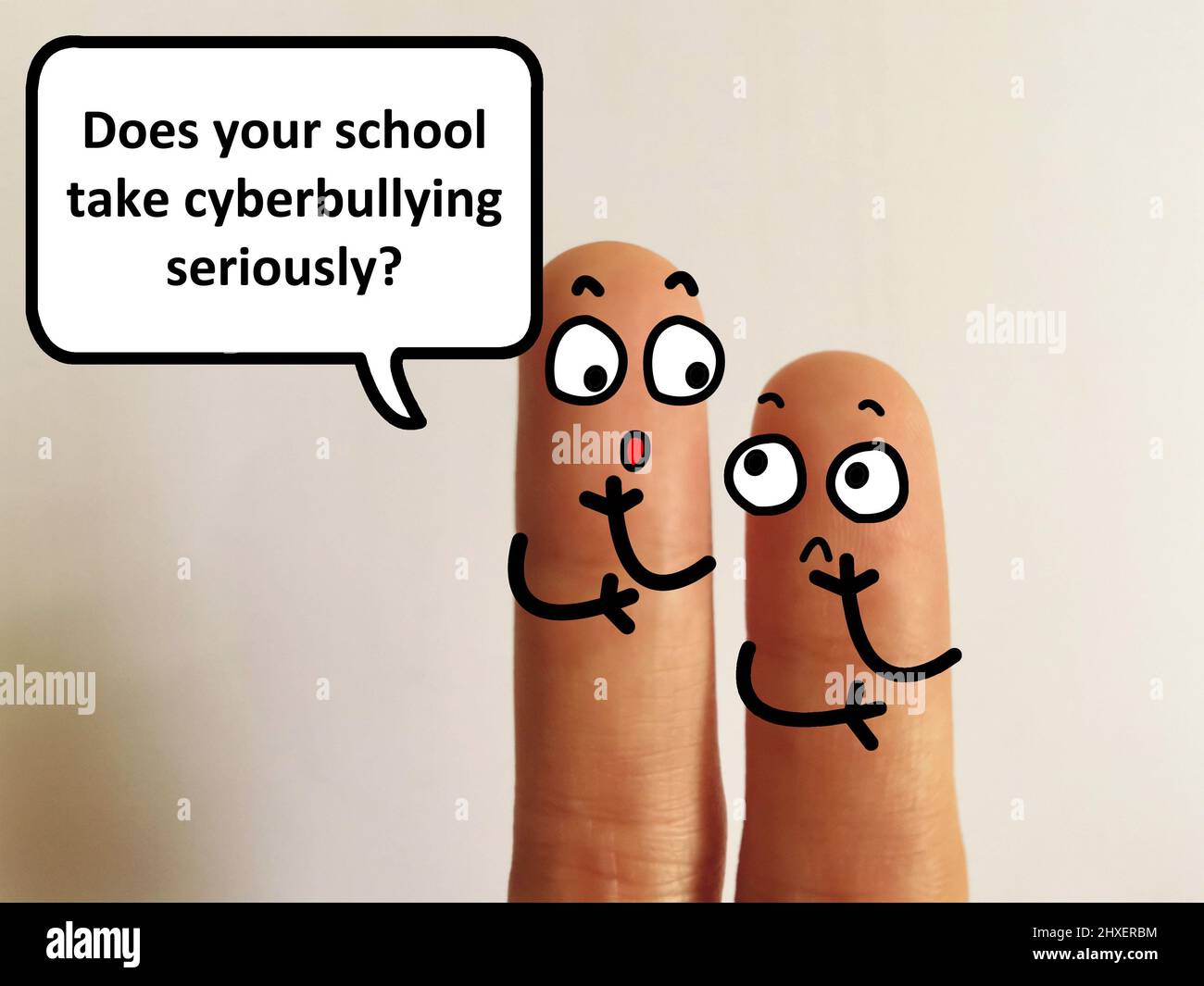 Two fingers are decorated as two person. They are discussing about