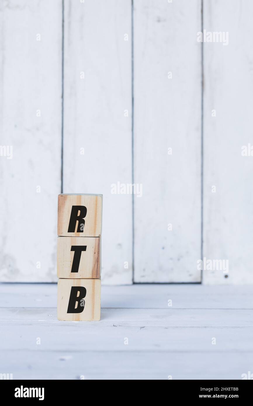 rtb concept written on wooden cubes or blocks, on white wooden background. Stock Photo