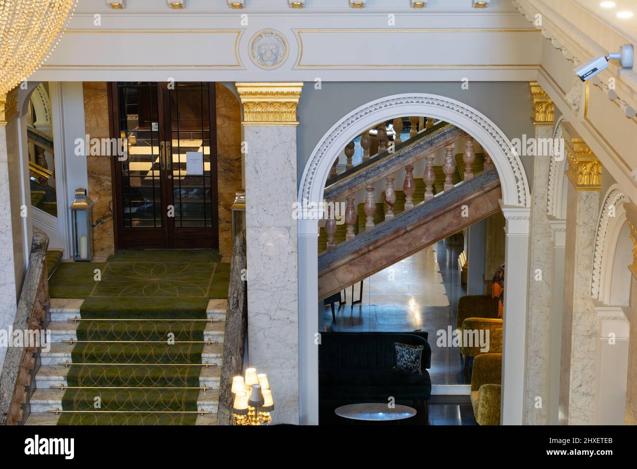 The Clermont Victoria hotel. Buckingham Palace Road, London, UK. Staircase in lobby. Stock Photo