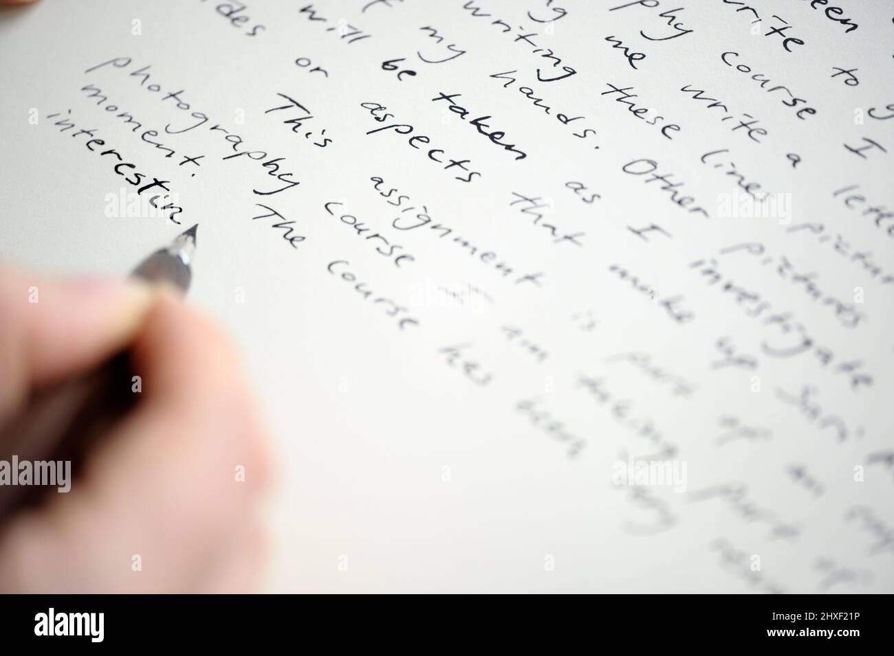 Writing letter to a friend Hand holding a fountain pen Stock Photo Alamy