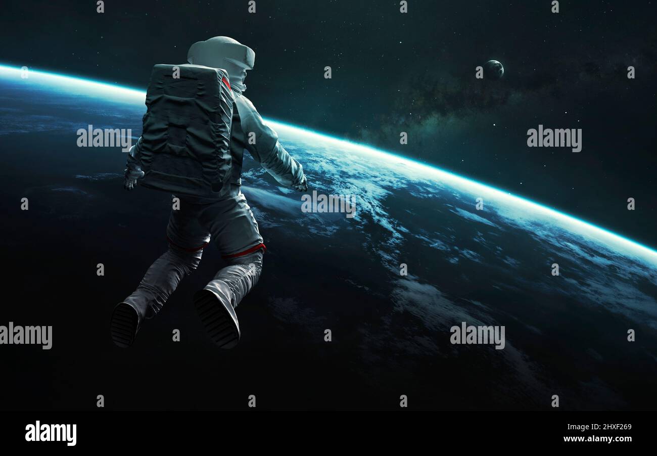 Astronaut at spacewalk orbiting Earth planet. Elements of image provided by Nasa Stock Photo