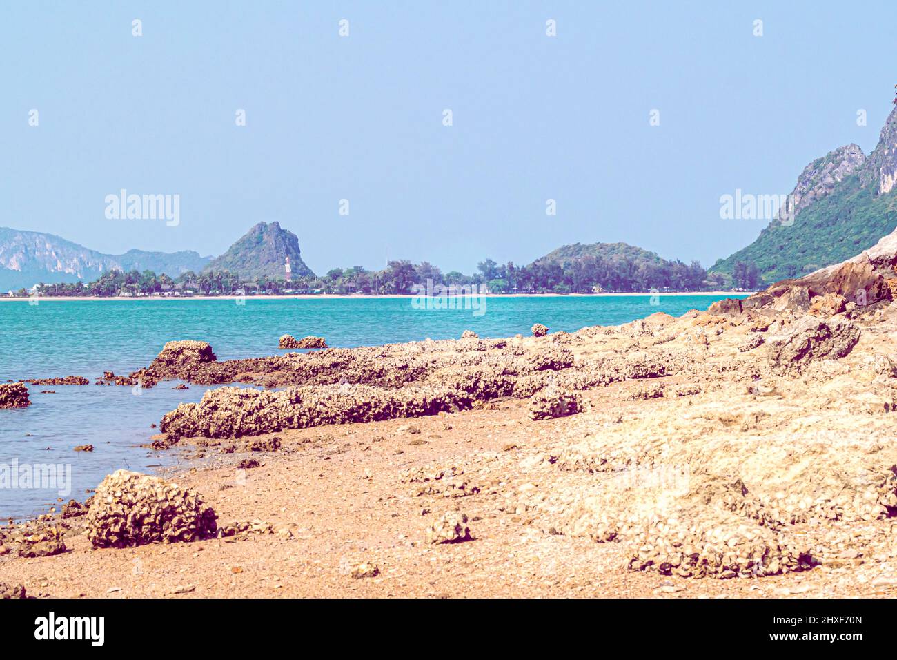 Beach rock horizon scenics Calm sea blue water ocean blue sky Stock ...