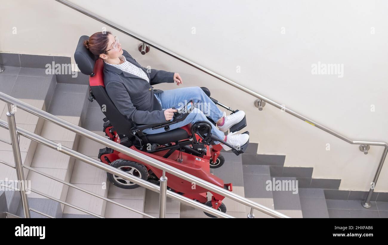 Girl wheelchair stairs hi-res stock photography and images - Alamy