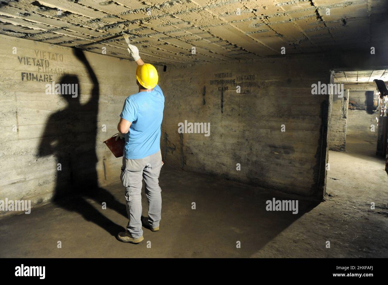 Milan, Italy, the Municipality is doing to restore a bomb shelter of World War II hidden under the fountain in Piazza Grandi; the refuge could hold between 450 and 500 people. Stock Photo