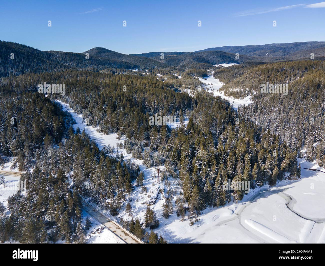 Aerial winter view of Beglika Reservoir covered with ice, Pazardzhik ...