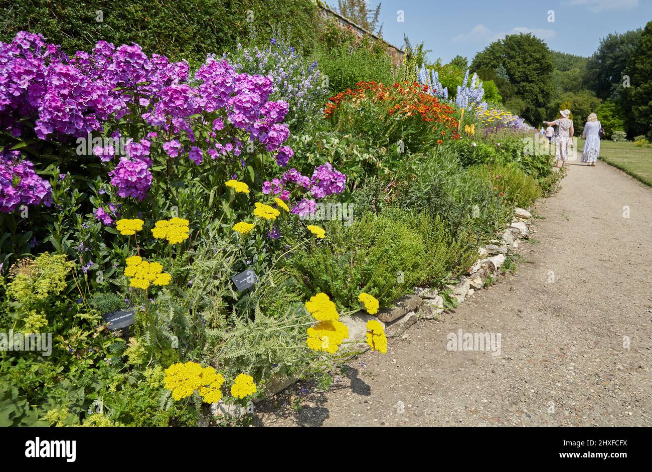 Magnificent walled herbaceous border at Waterperry Gardens near Oxford UK Stock Photo