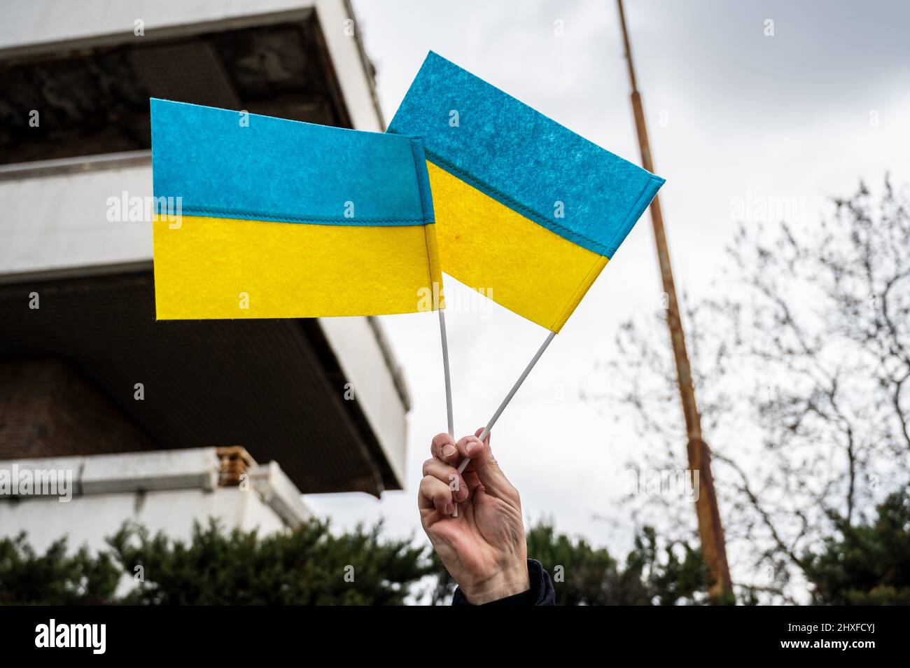 Madrid, Spain. 12th Mar, 2022. Ukrainian flags are seen during a protest against war. Ukrainians and Russians living in Madrid gathered to protest in front of the Russian embassy against the Russian invasion of Ukraine demanding the end of war. Credit: Marcos del Mazo/Alamy Live News Stock Photo