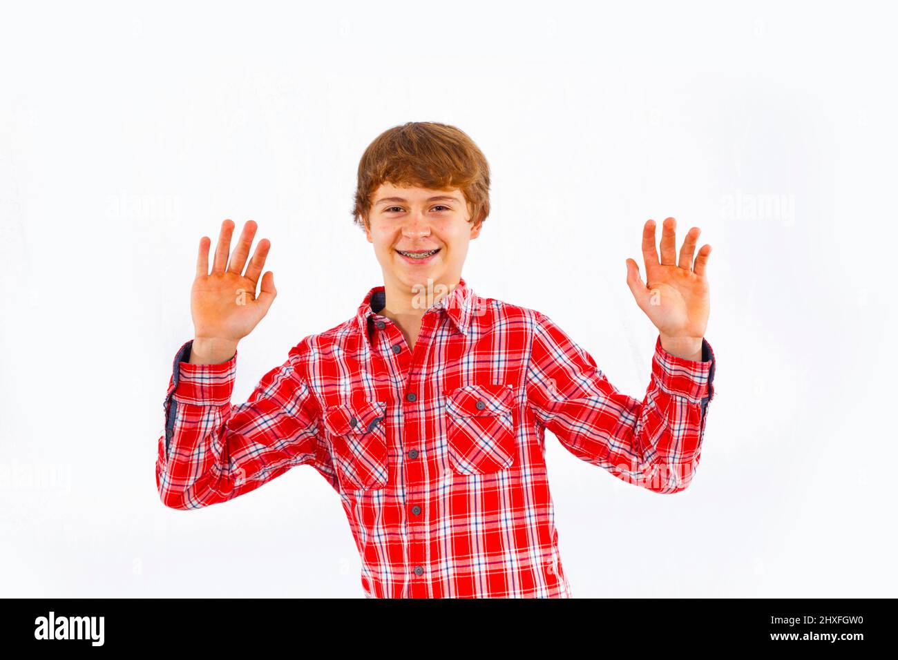 attractive smiling boy in studio Stock Photo - Alamy